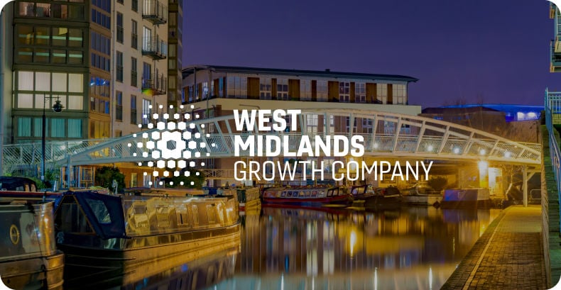 View of buildings and a canal with west midlands growth company logo overlay