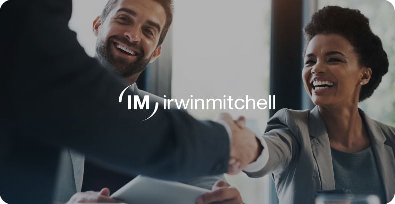 Professionals shaking hands with Irwin Mitchell logo overlay