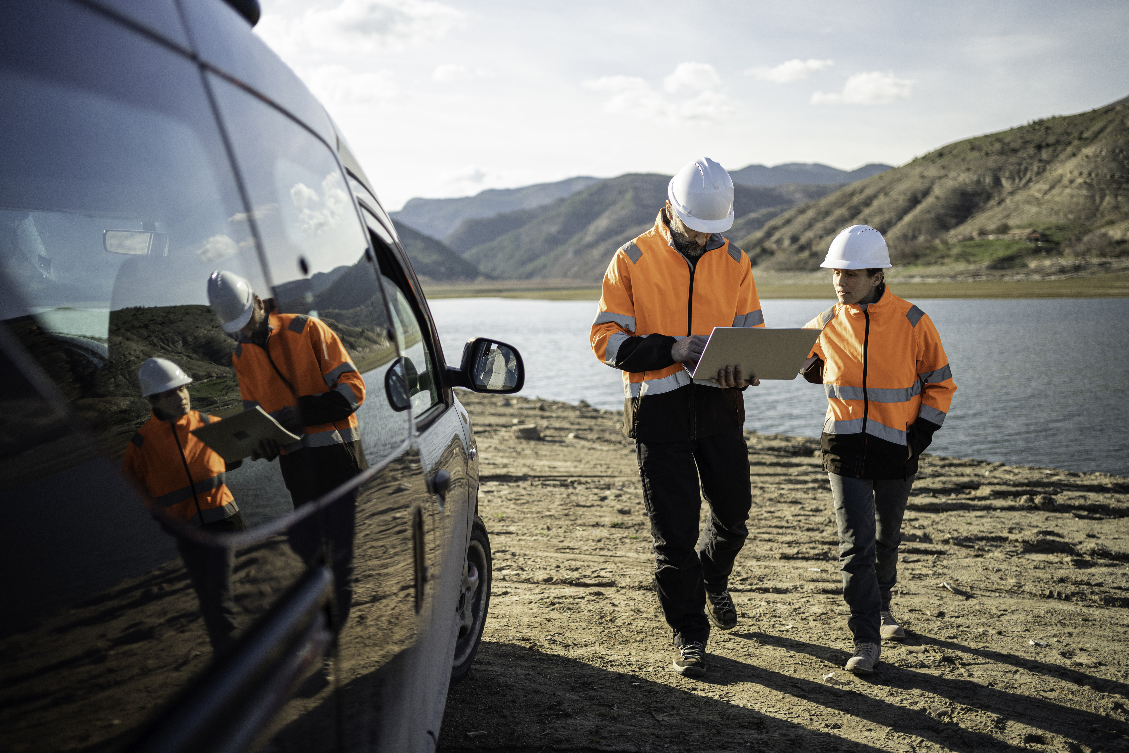 An image of workers from the energy sector out in the field, which was used within our 2025 Desk-Free Worker Report.