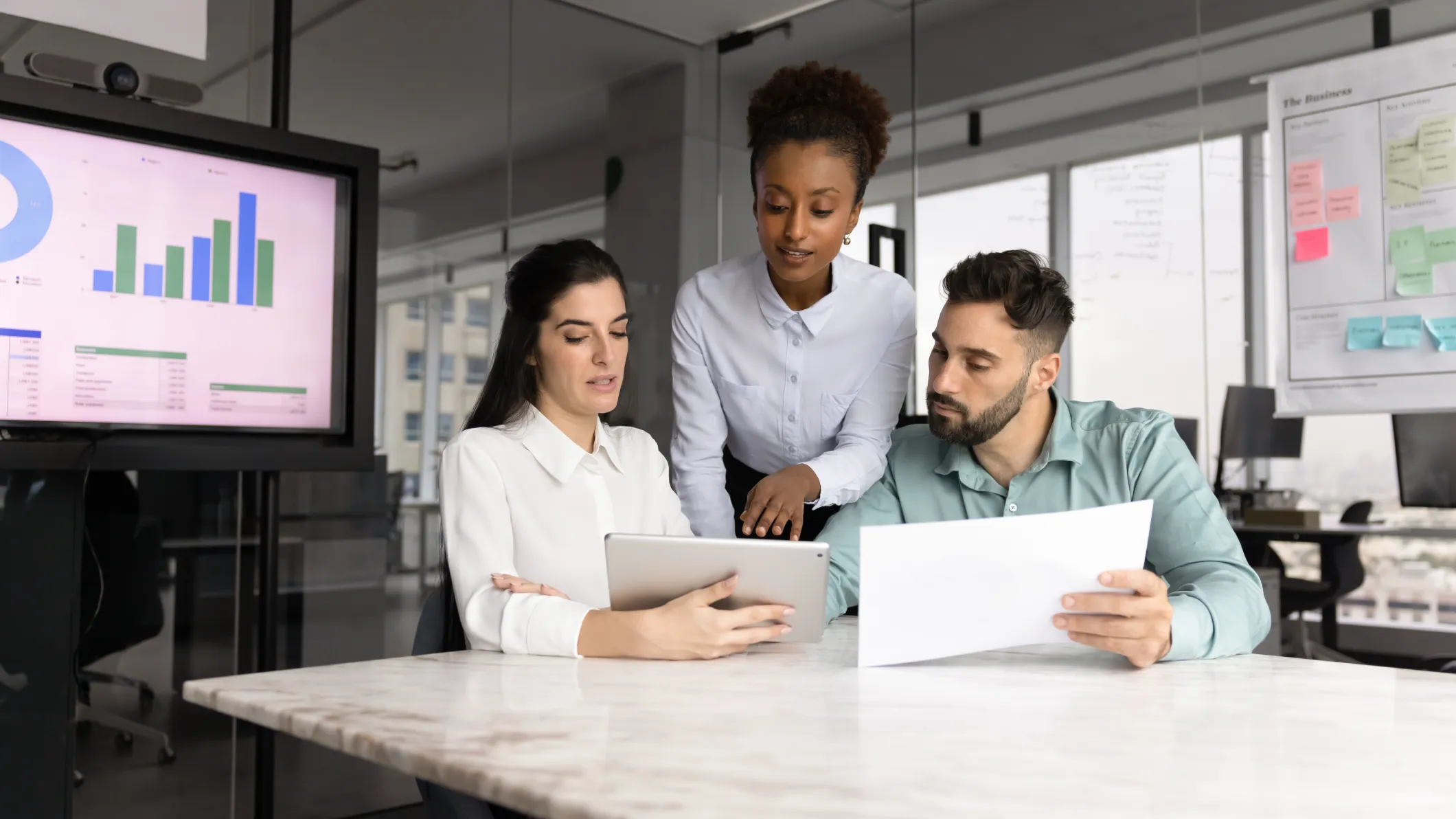 Workforce collaborating in office workspace