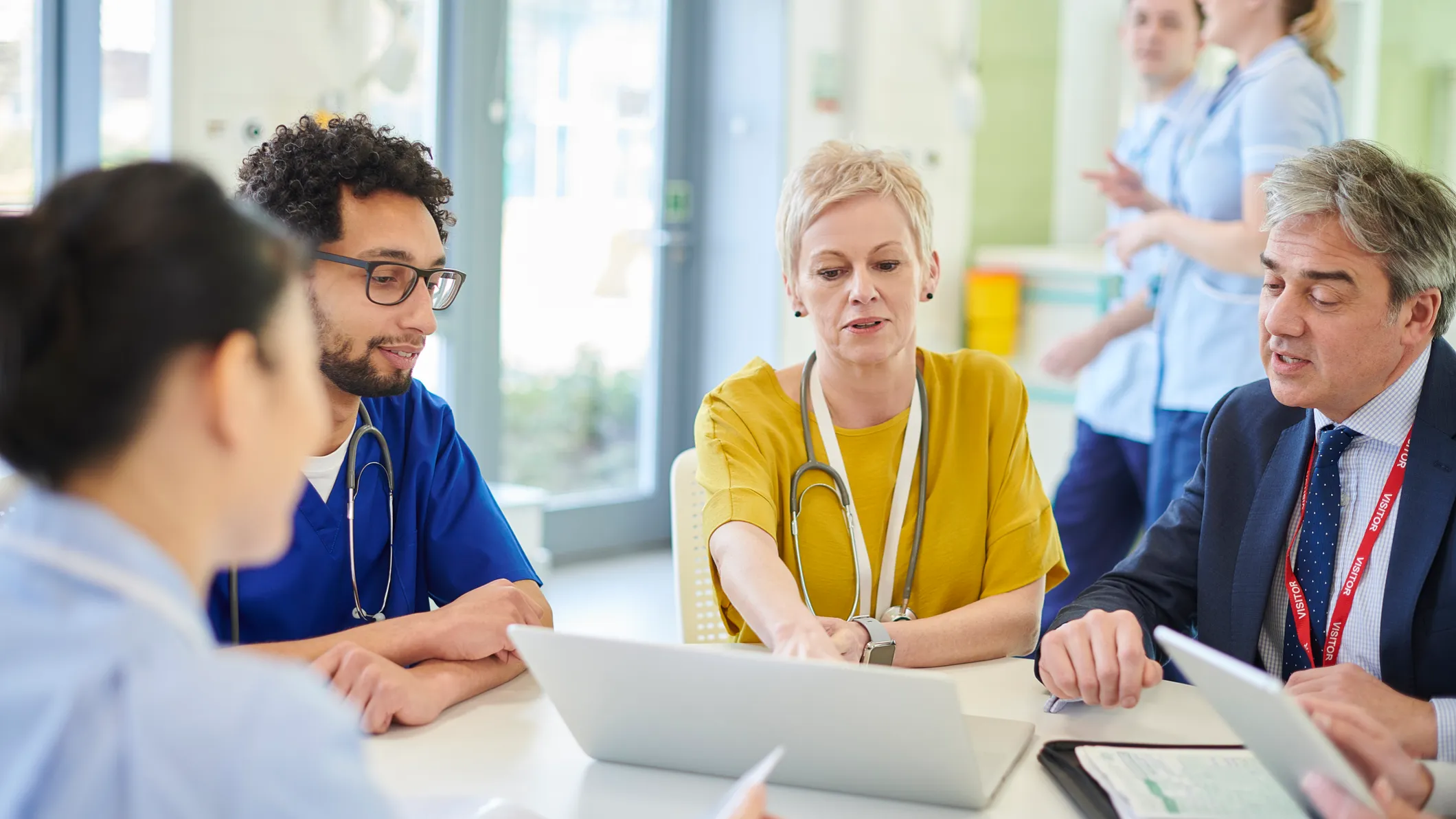 nhs team meeting in hospital setting