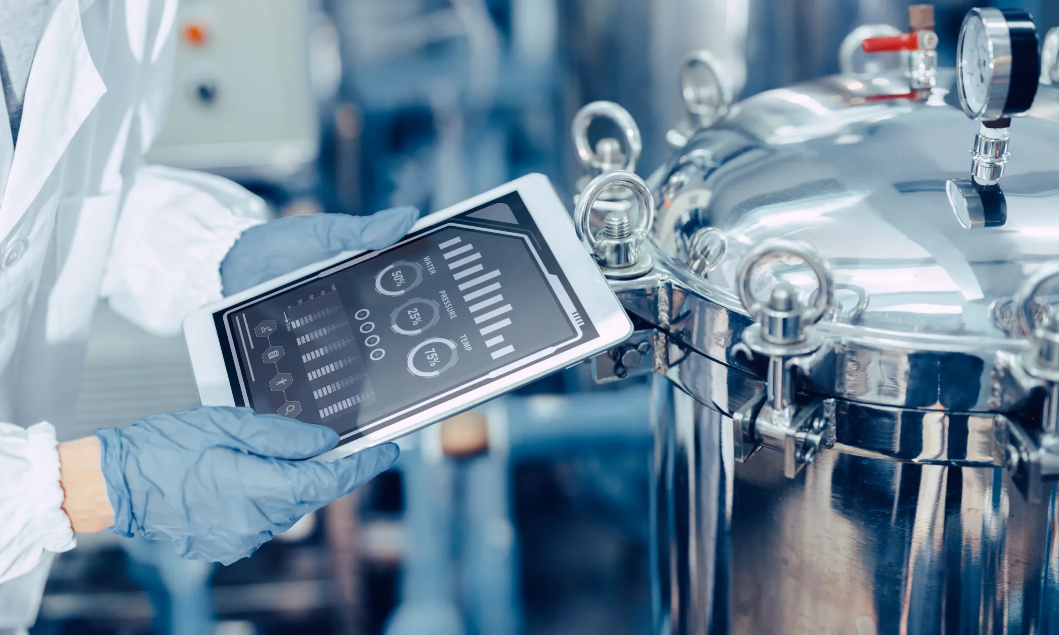 Factory worker monitoring food & beverage operation with manufacturing ERP software