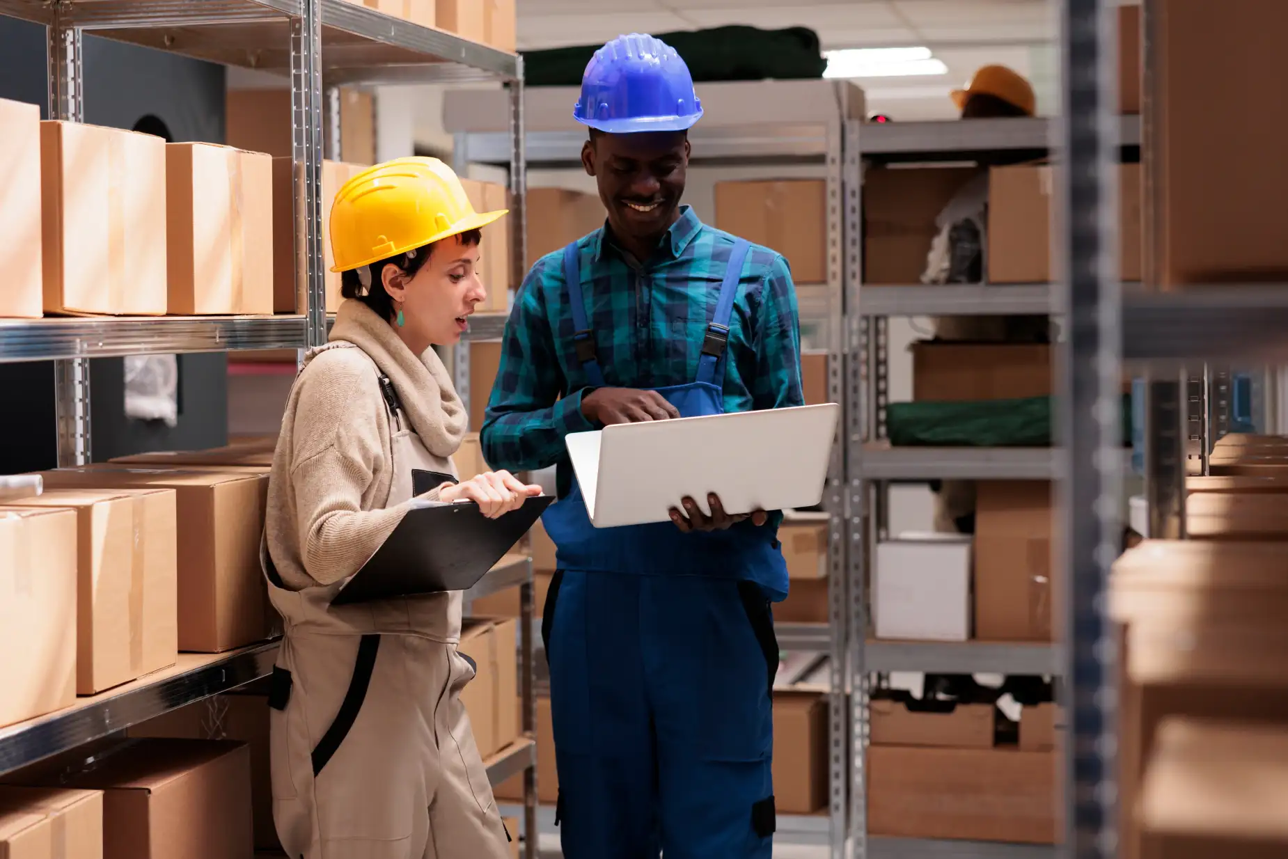 A manager using software to monitor financial performance in a logistics environment