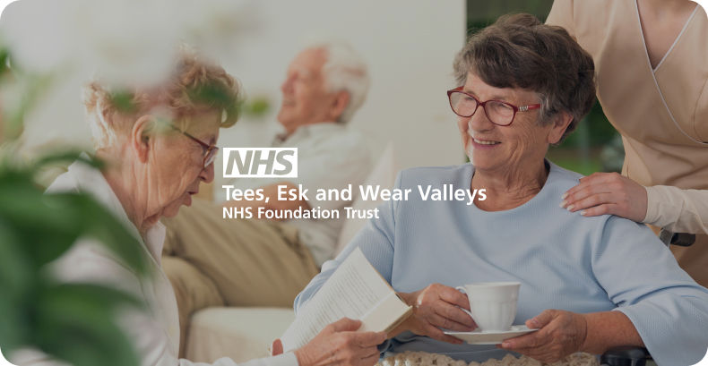 nhs Care home residents drinking tea and reading